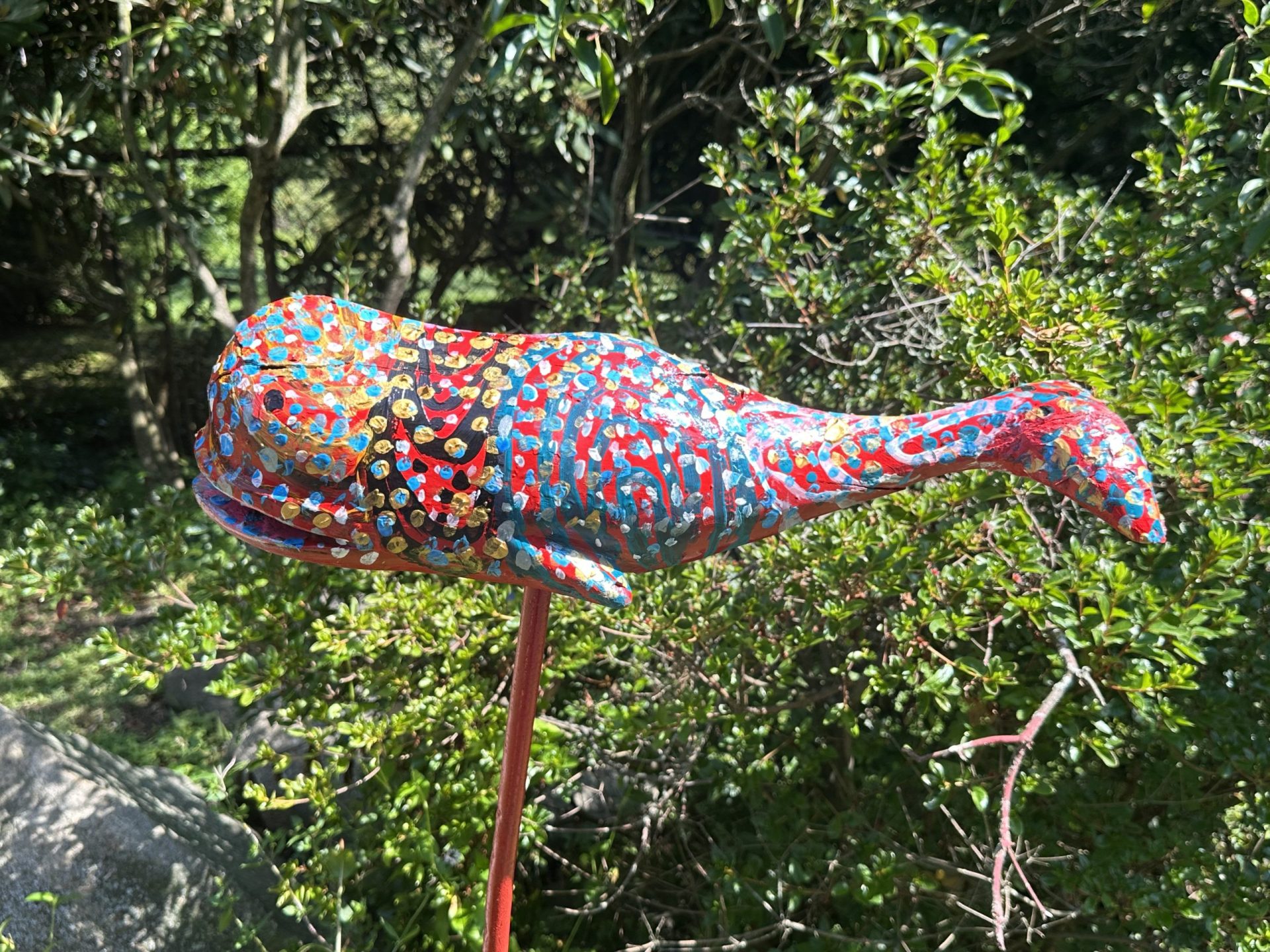 Colorful whale sculpture outdoors