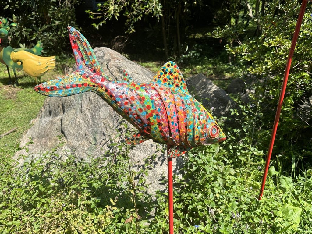 Colorful fish sculpture hanging