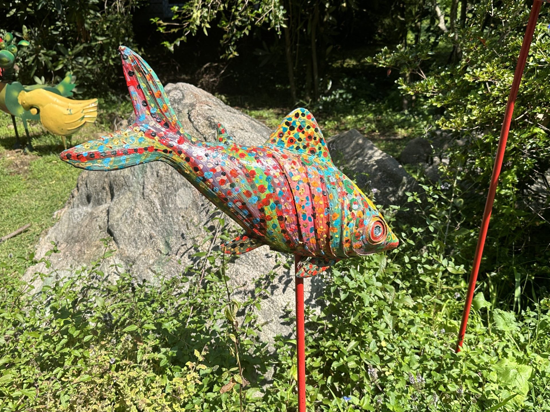 Colorful fish sculpture hanging