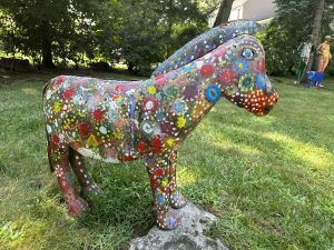 Colorful painted goat sculpture