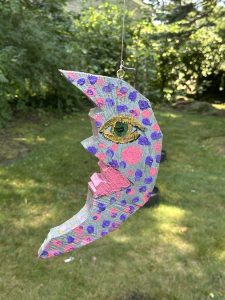 Colorful crescent moon sculpture